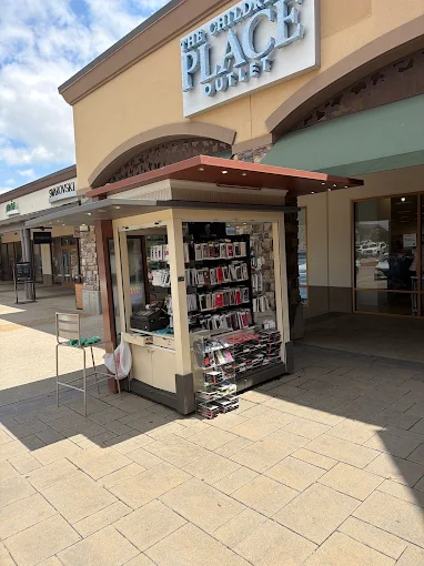 Gadget Fix storefront kiosk at The Village at Allen shopping center